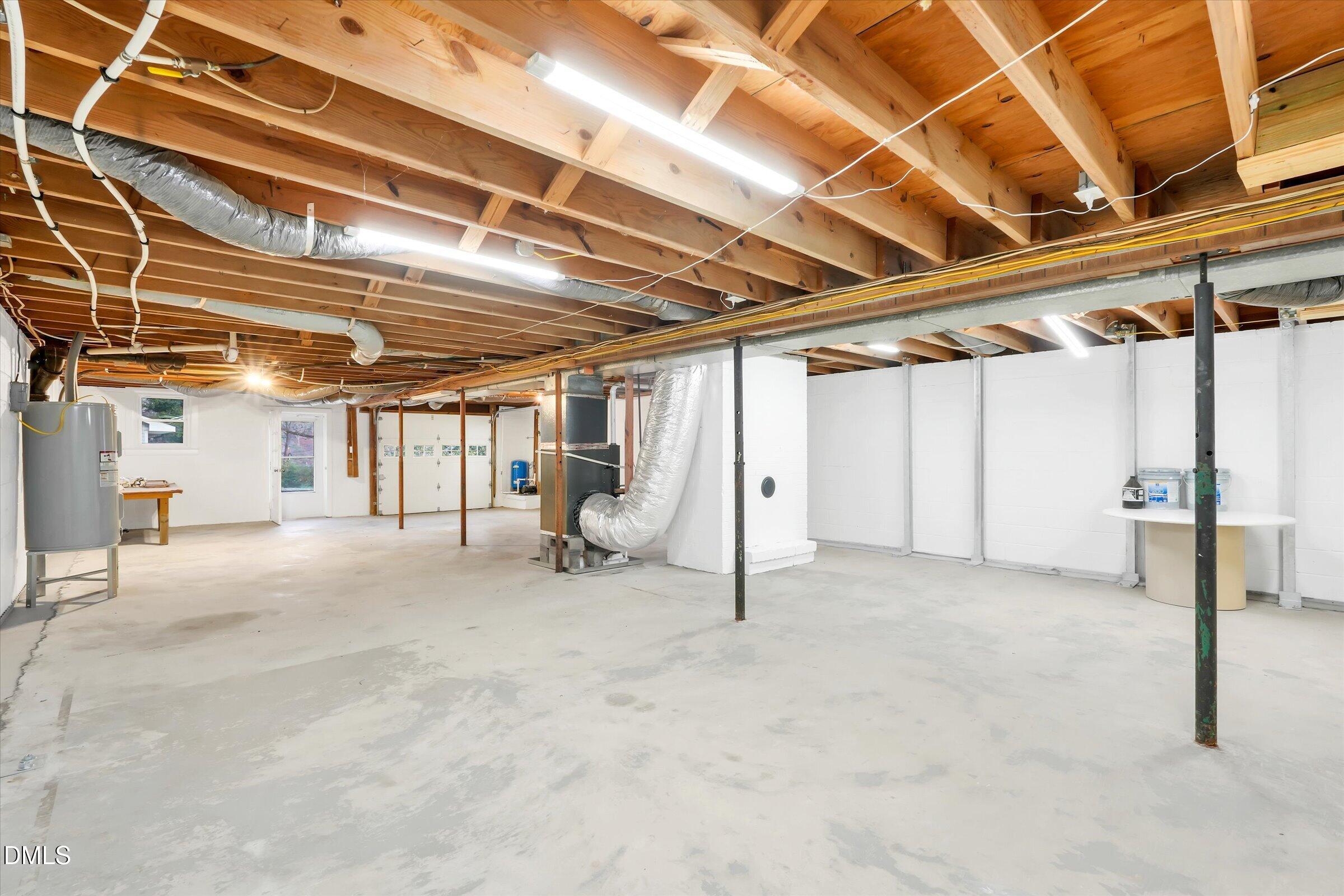 4108 Campbell Road Raleigh, NC 27606 - Photo 30 of 42 a view of empty room with wooden ceiling