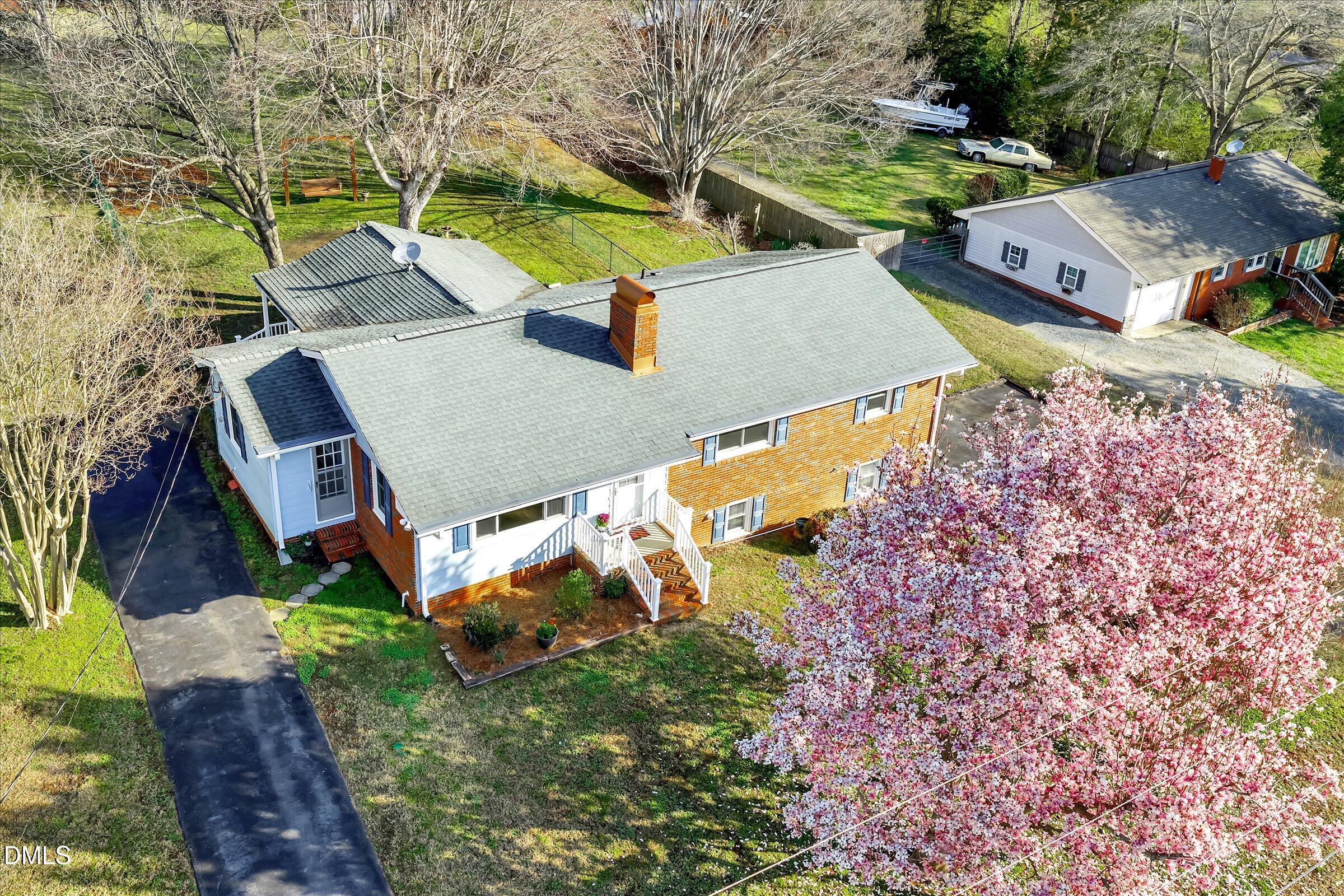4108 Campbell Road Raleigh, NC 27606 - Photo 32 of 42 an aerial view of a house with a yard basket ball court and outdoor seating