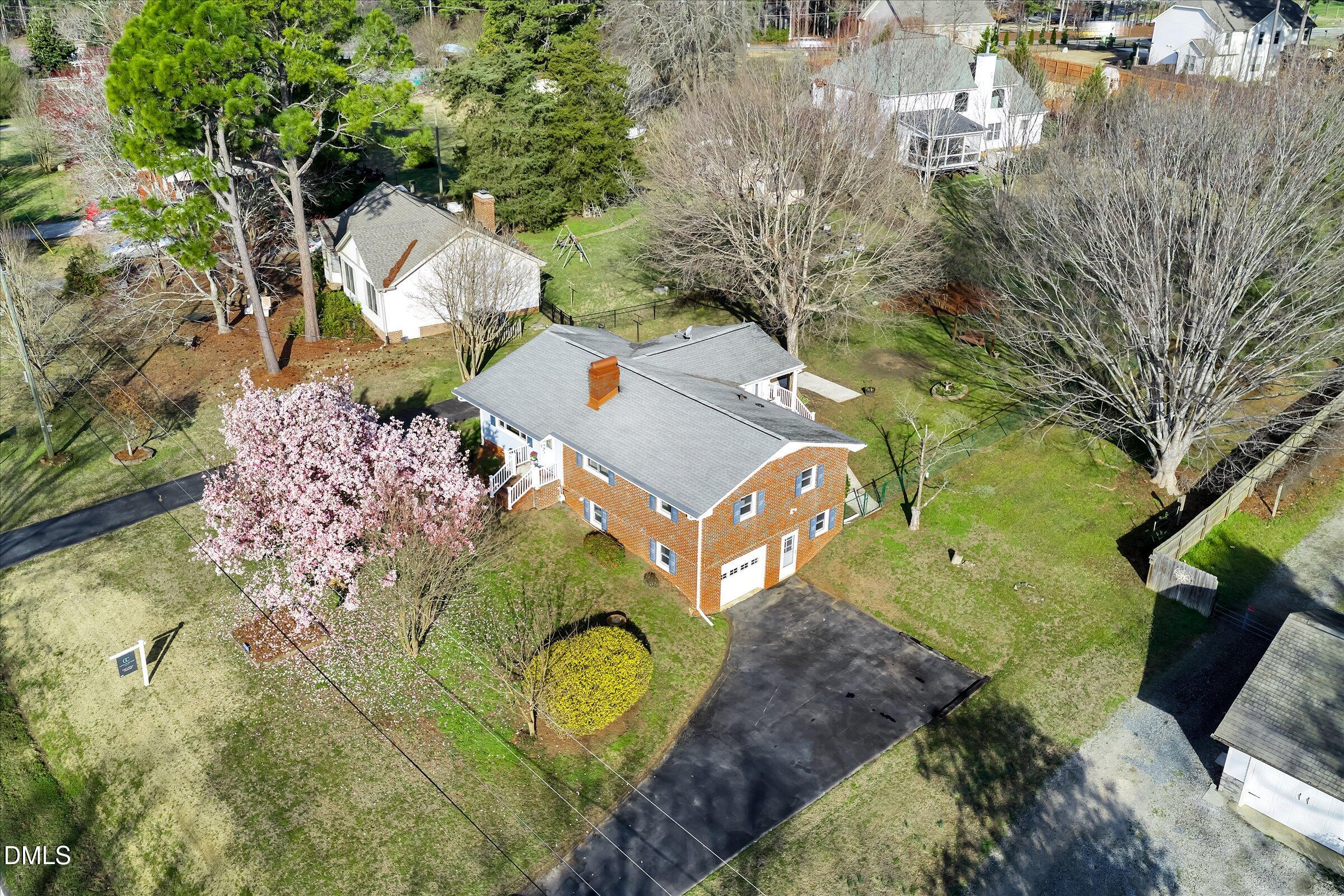 4108 Campbell Road Raleigh, NC 27606 - Photo 34 of 42 an aerial view of a house with a yard