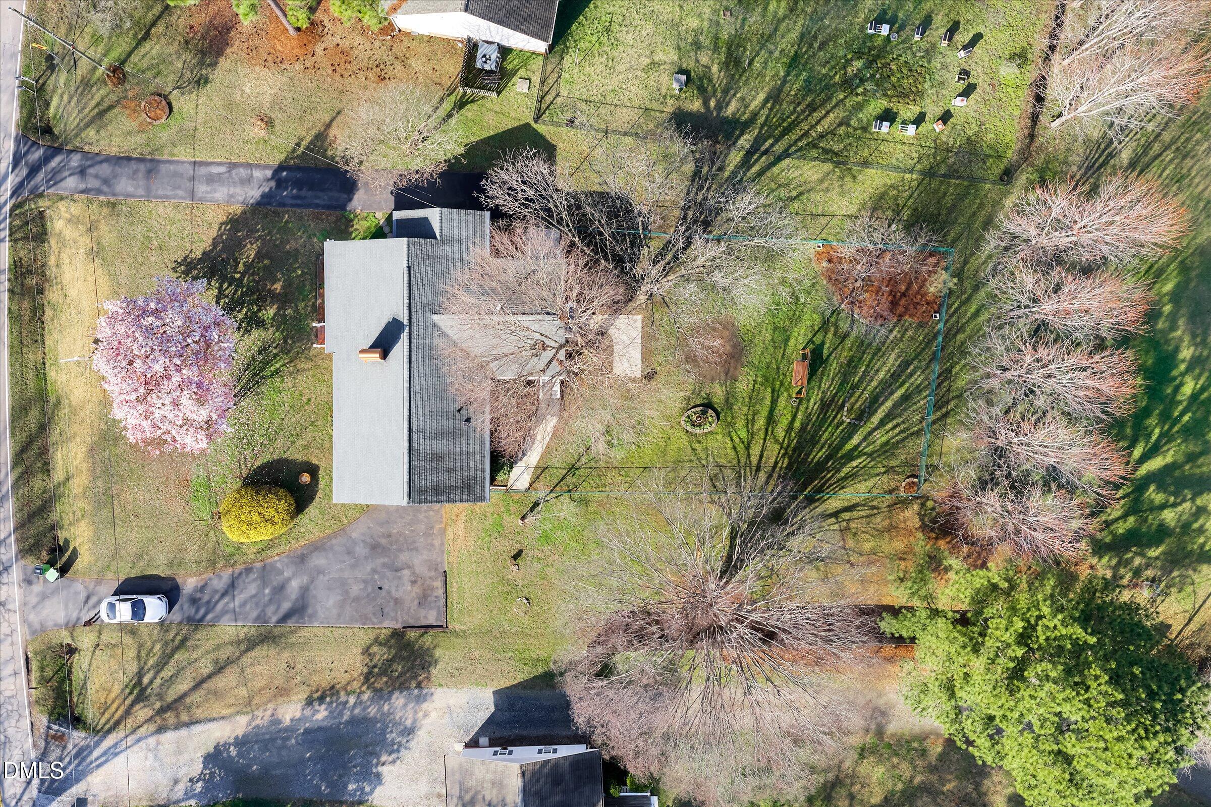 4108 Campbell Road Raleigh, NC 27606 - Photo 37 of 42 an aerial view of a house with a yard