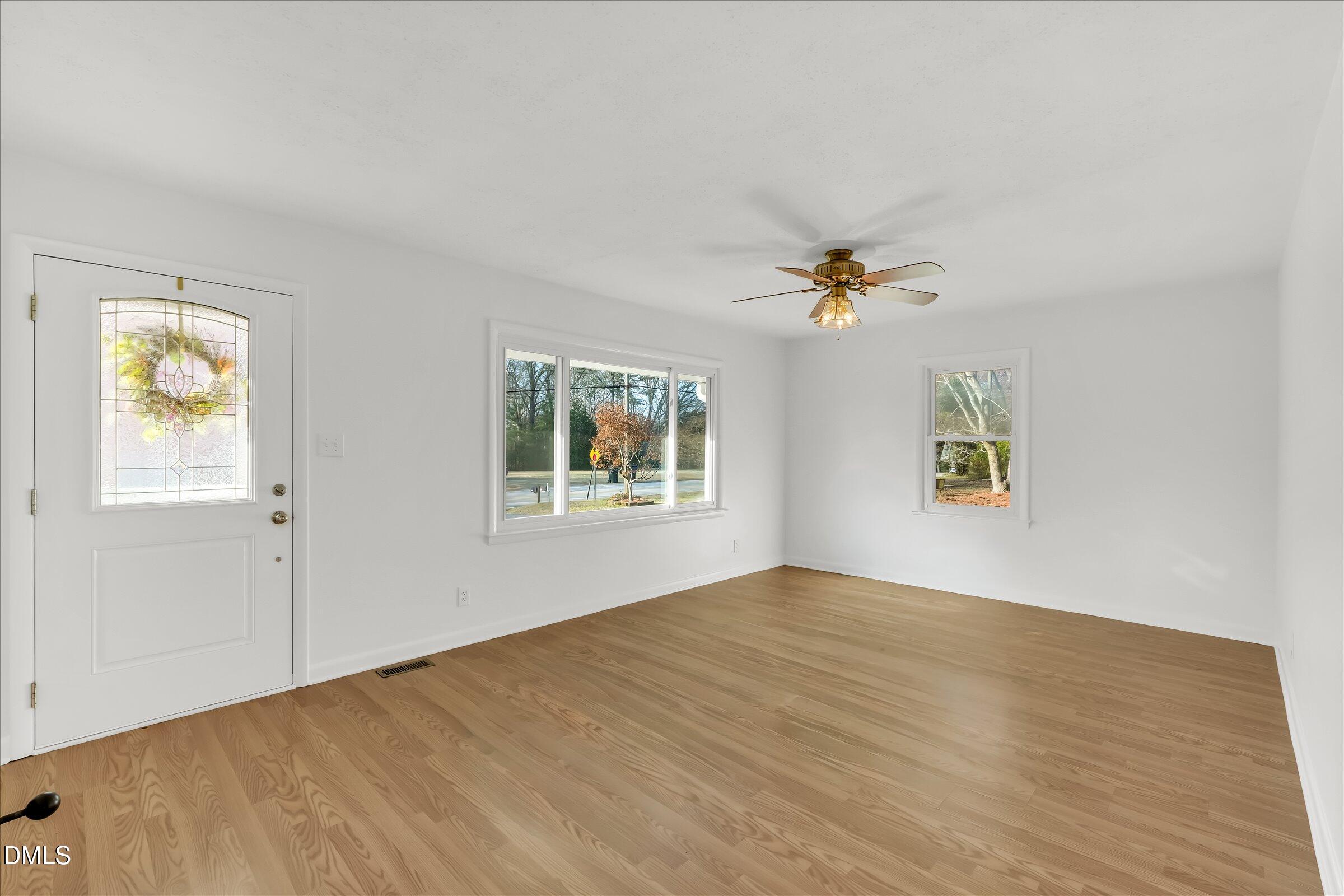 4108 Campbell Road Raleigh, NC 27606 - Photo 4 of 42 a view of an empty room with a window