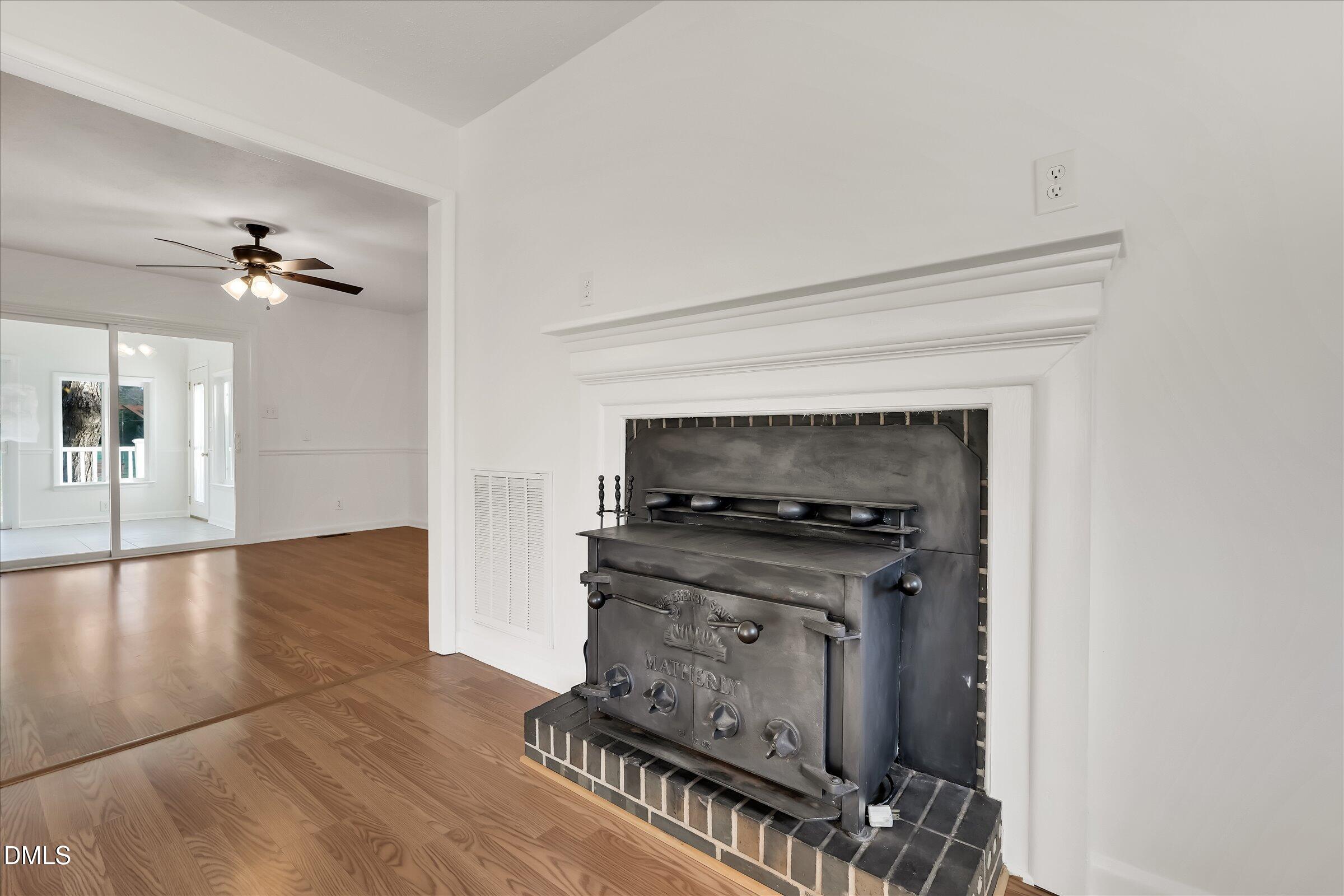 4108 Campbell Road Raleigh, NC 27606 - Photo 7 of 42 a living room with furniture and a fireplace
