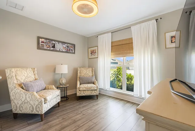a living room with furniture and a window