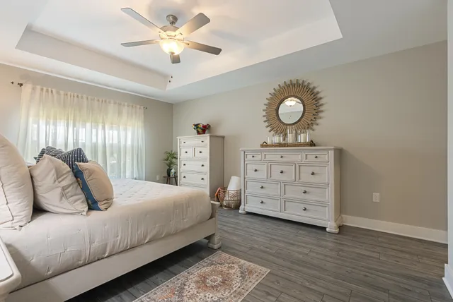 a bedroom with a bed and a closet