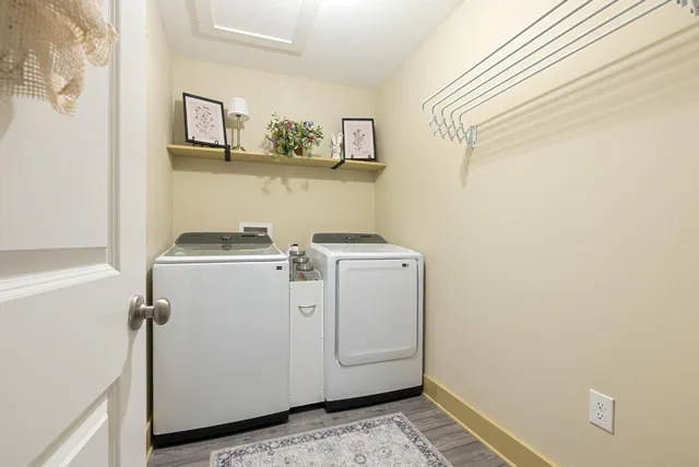 a view of storage and utility room with washer and dryer
