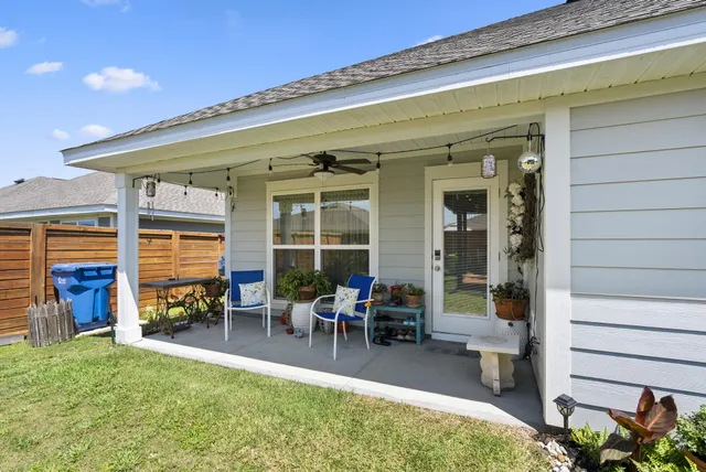 a view of sitting area in front of house