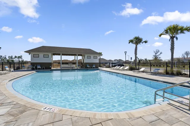 a view of a swimming pool and a terrace