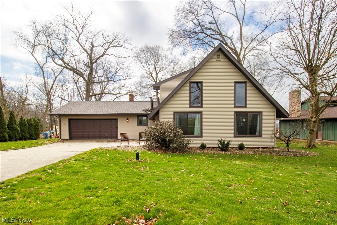 1644 Moore Road Wooster, OH 44691 - Photo 1 of 30 View of front of house featuring a front lawn and a garage