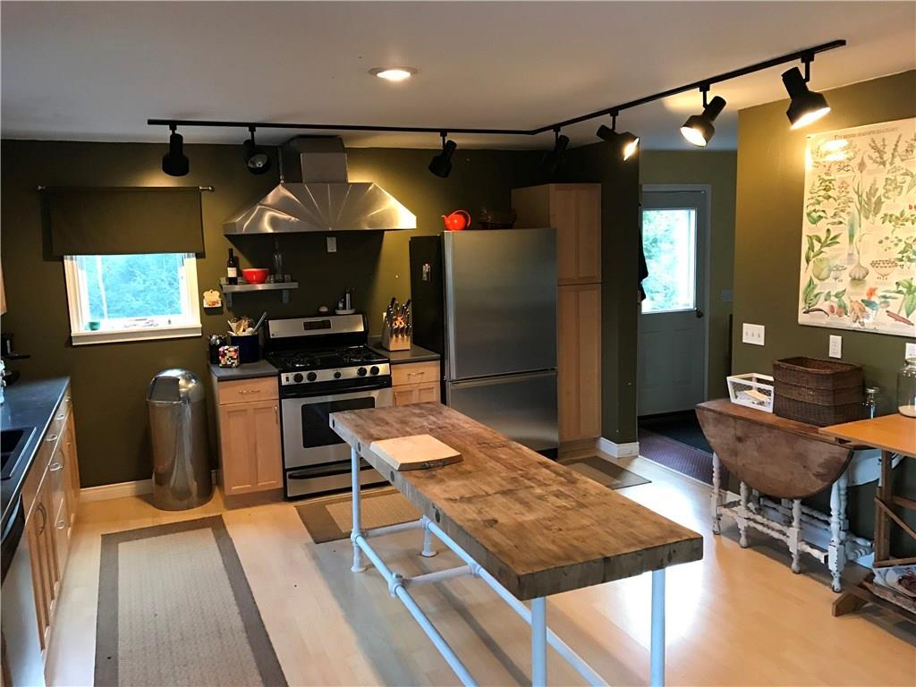187 Shore Road Perry, ME 04667 - Photo 10 of 35 View from living room into kitchen...