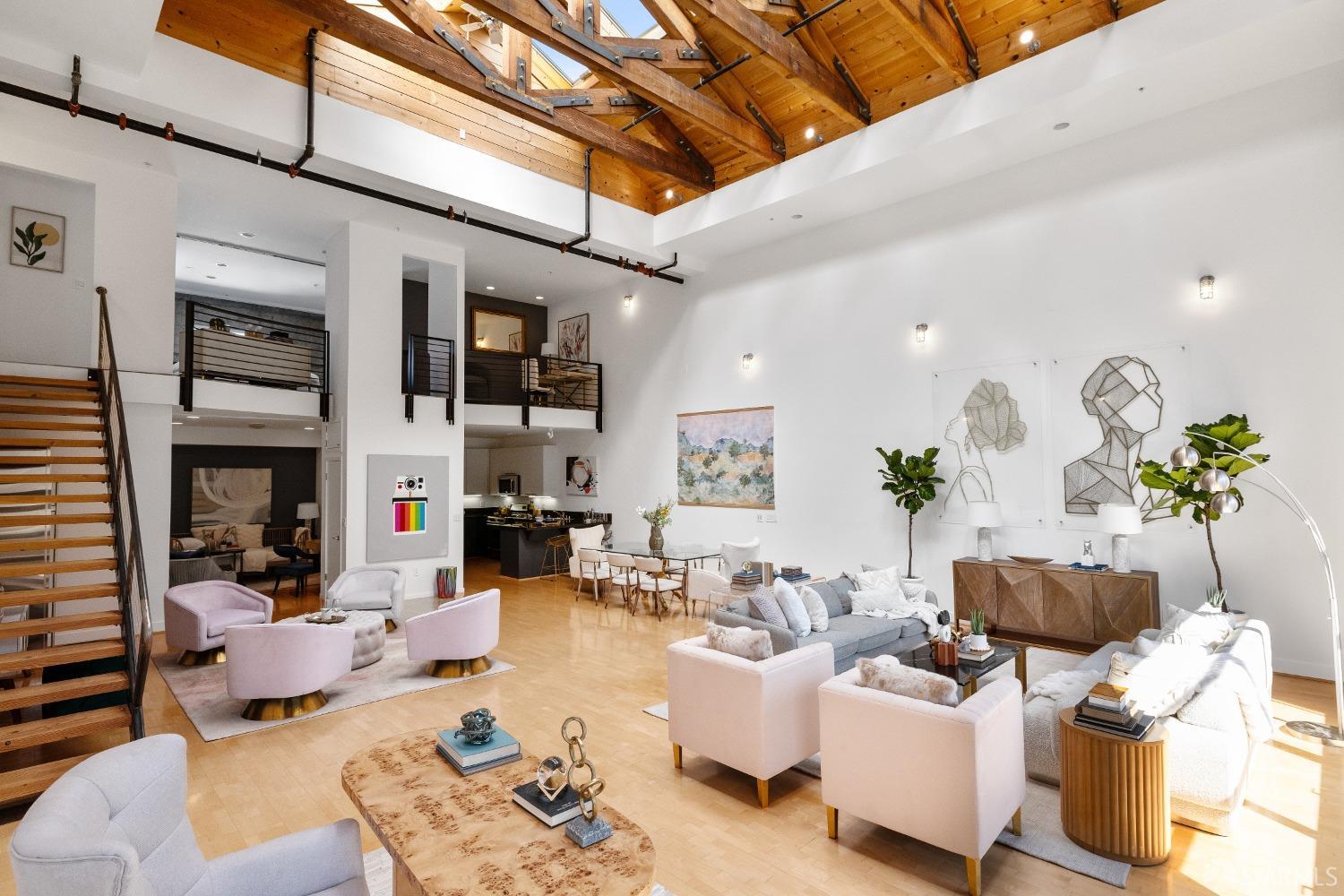 1 Rausch Street, Unit G San Francisco, CA 94103 - Photo 11 of 49 a living room with furniture and a flat screen tv