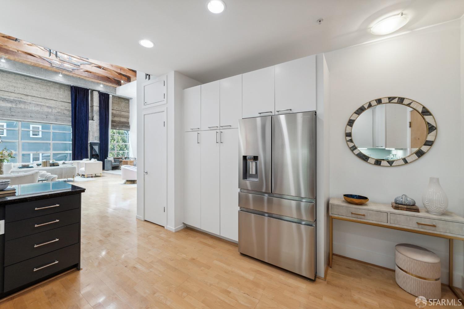 1 Rausch Street, Unit G San Francisco, CA 94103 - Photo 16 of 49 a kitchen with a refrigerator and a sink