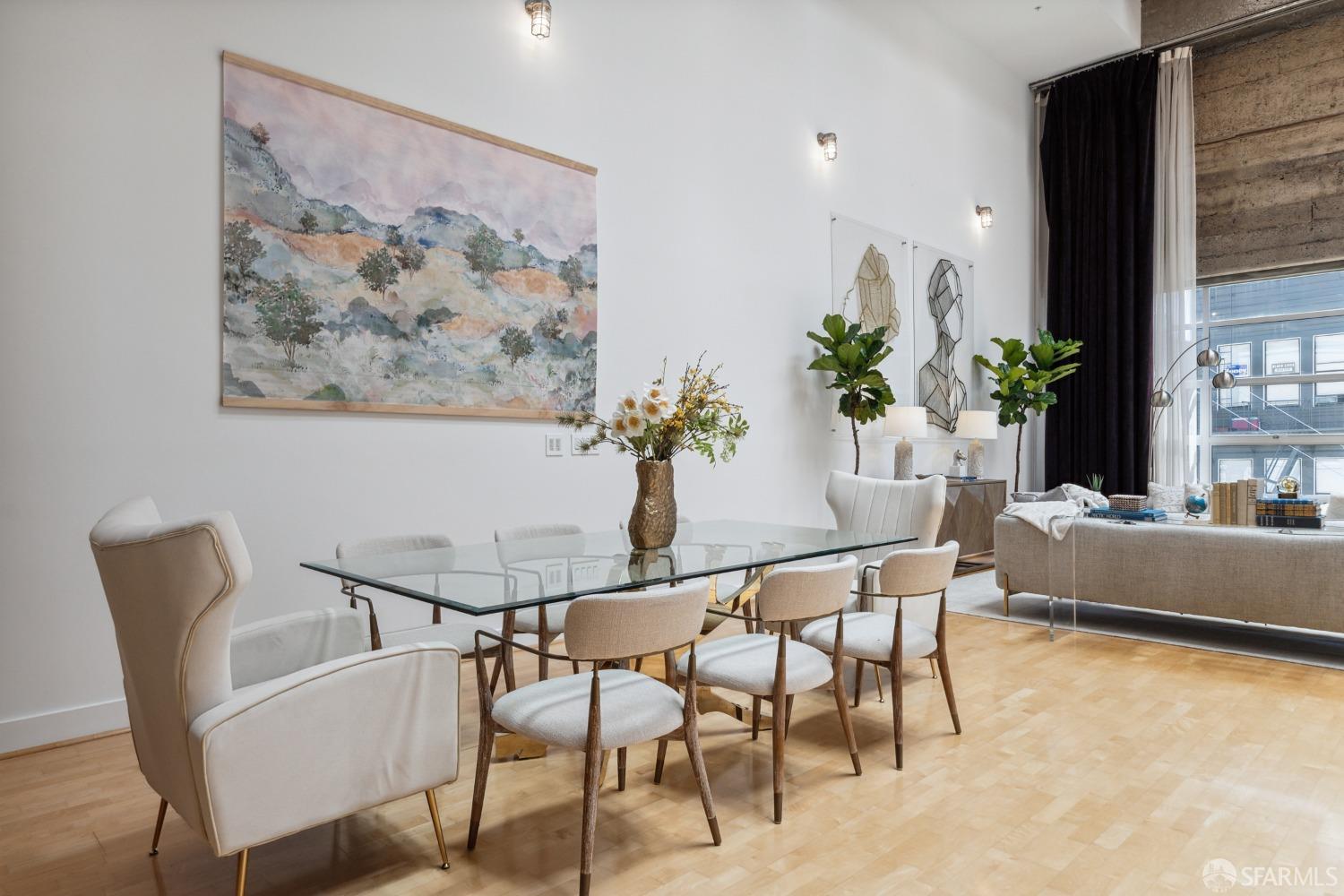 1 Rausch Street, Unit G San Francisco, CA 94103 - Photo 17 of 49 a dining room with furniture and a potted plant