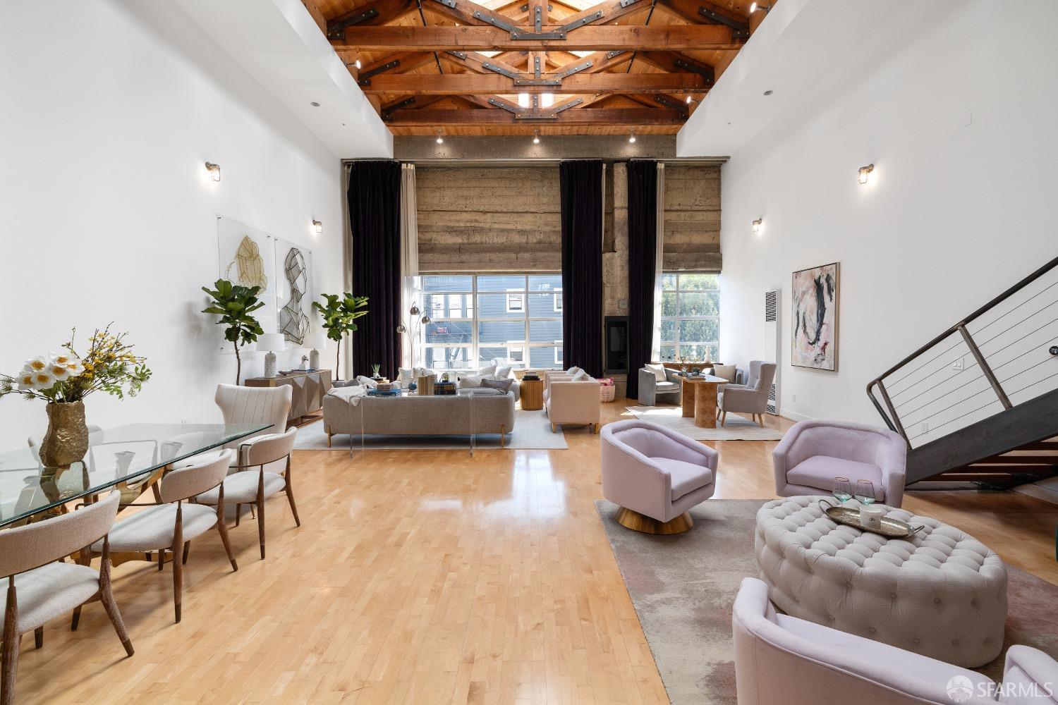 1 Rausch Street, Unit G San Francisco, CA 94103 - Photo 2 of 49 a living room with furniture and a large window