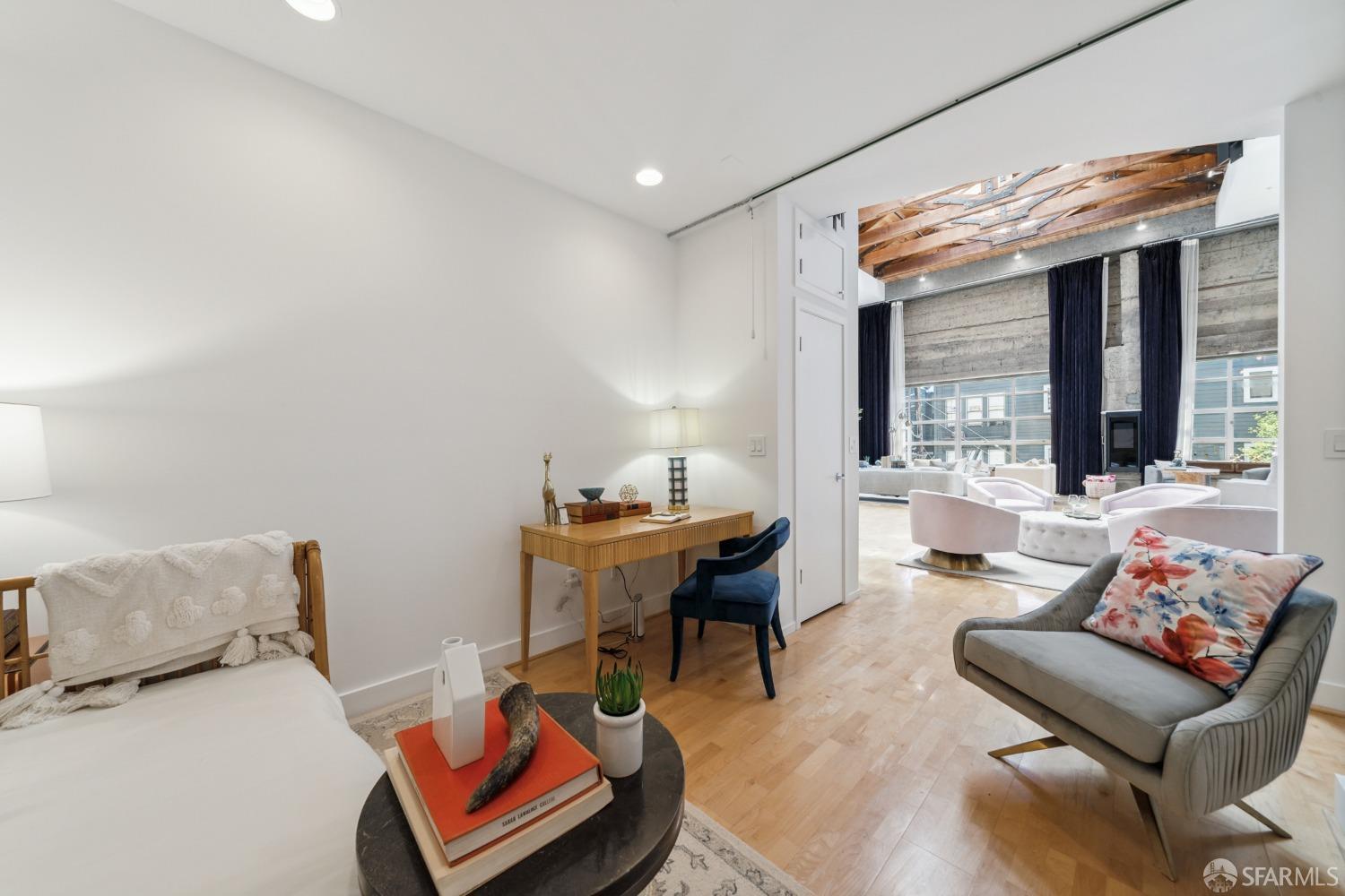 1 Rausch Street, Unit G San Francisco, CA 94103 - Photo 28 of 49 a living room with furniture and a large window