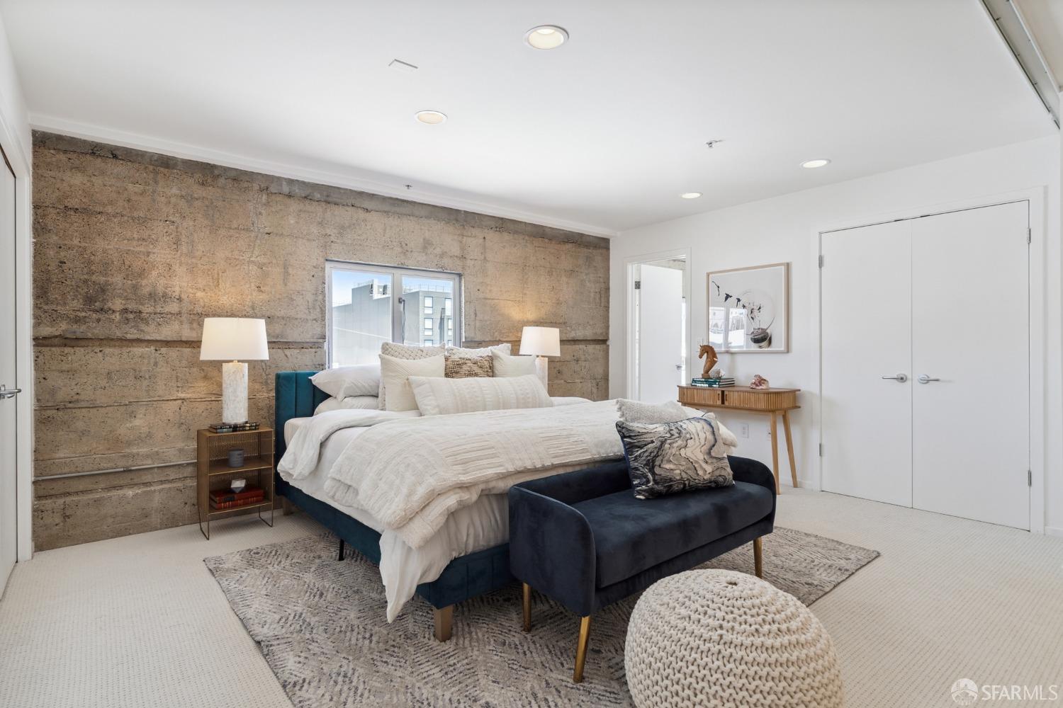 1 Rausch Street, Unit G San Francisco, CA 94103 - Photo 30 of 49 a bedroom with a bed and a couch