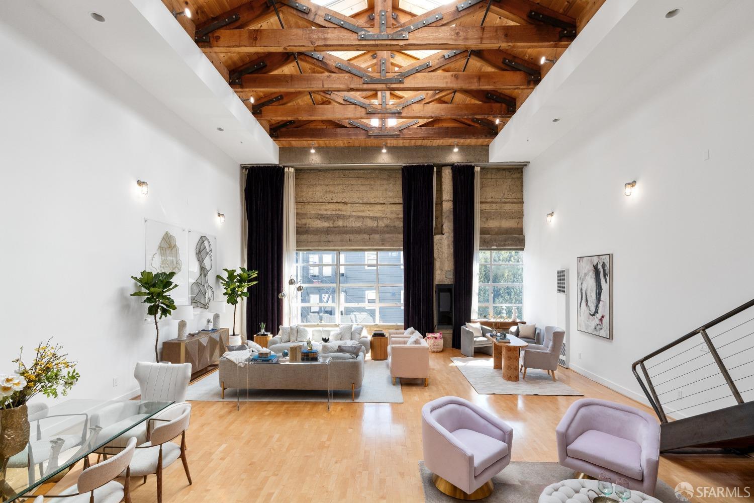 1 Rausch Street, Unit G San Francisco, CA 94103 - Photo 3 of 49 a living room with furniture and a large window
