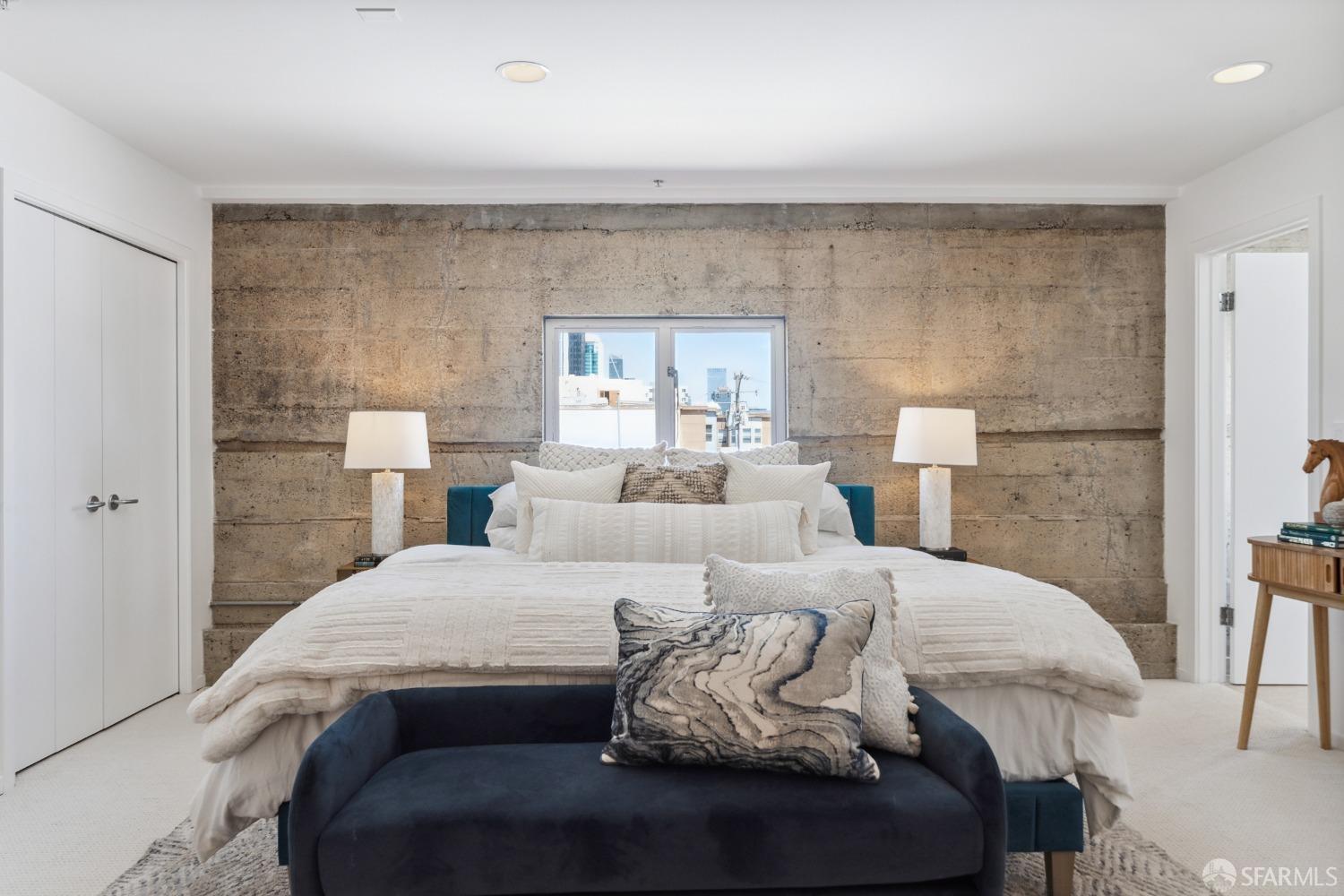 1 Rausch Street, Unit G San Francisco, CA 94103 - Photo 31 of 49 a bedroom with a bed and a lamp