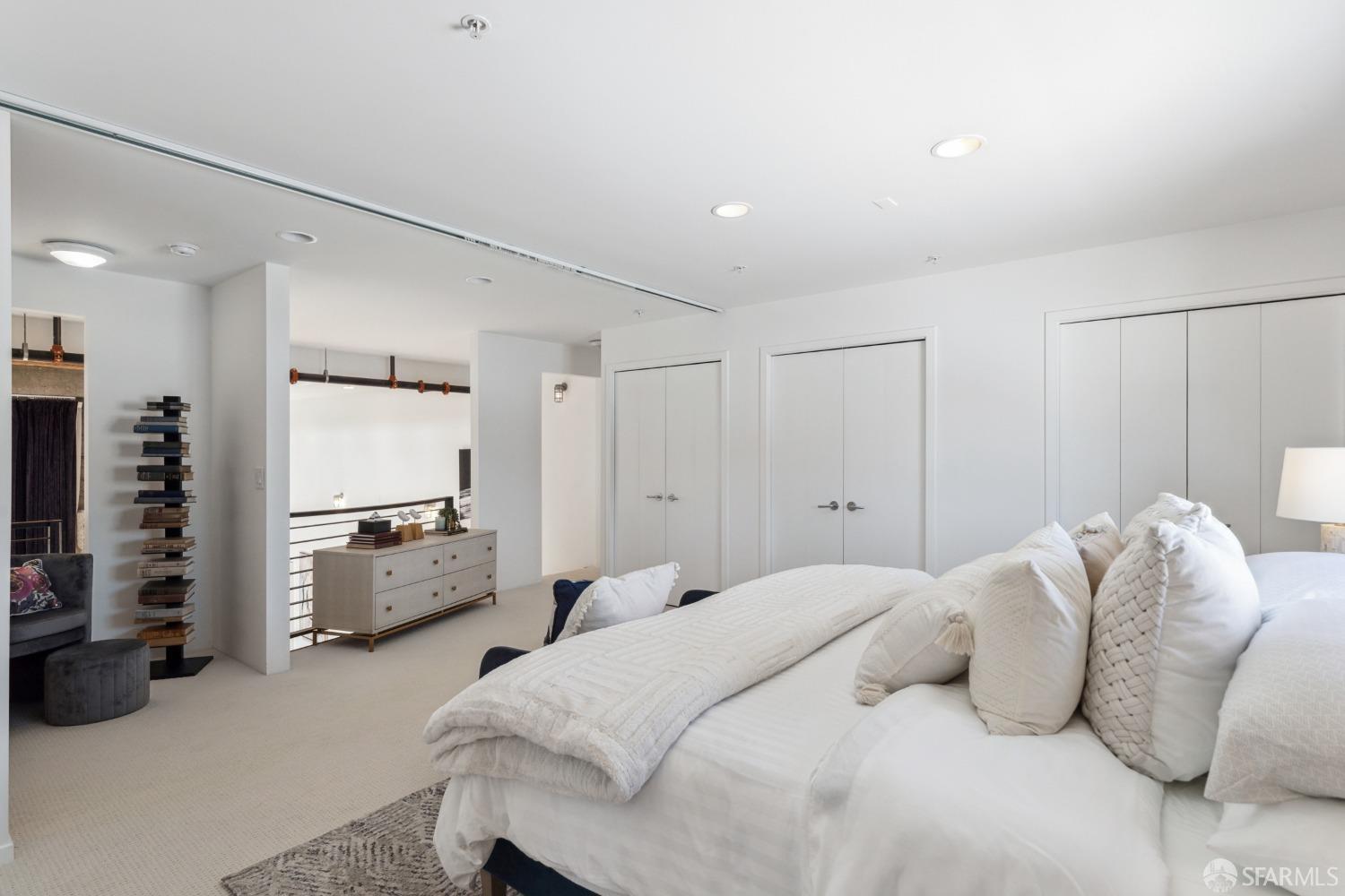 1 Rausch Street, Unit G San Francisco, CA 94103 - Photo 33 of 49 a bedroom with a bed and a couch