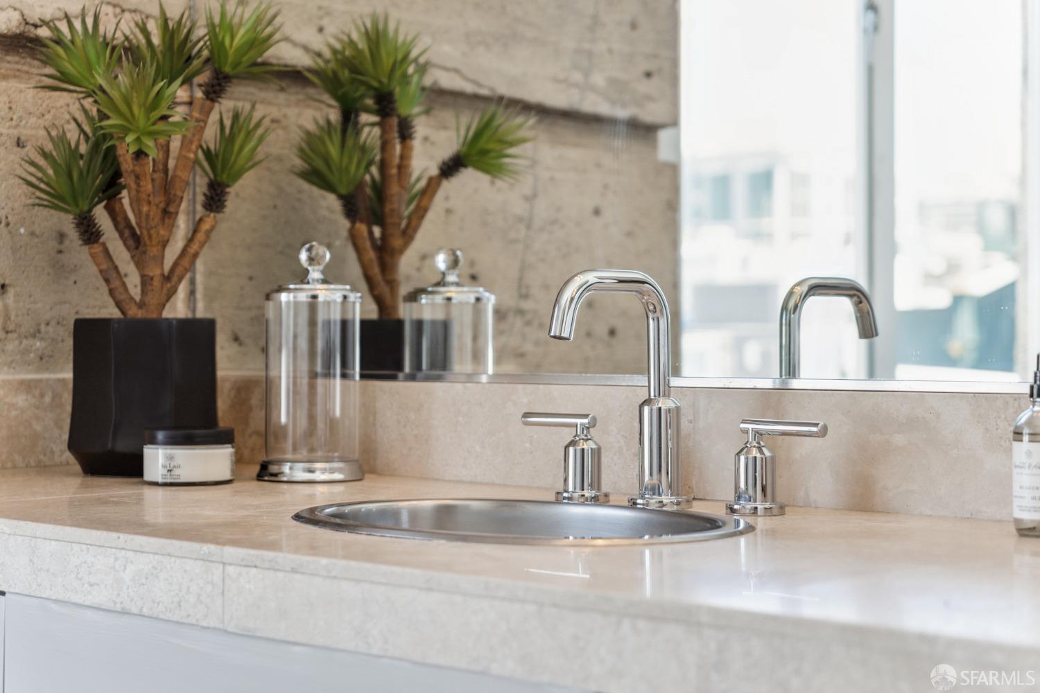 1 Rausch Street, Unit G San Francisco, CA 94103 - Photo 38 of 49 a close view of sink and mirror