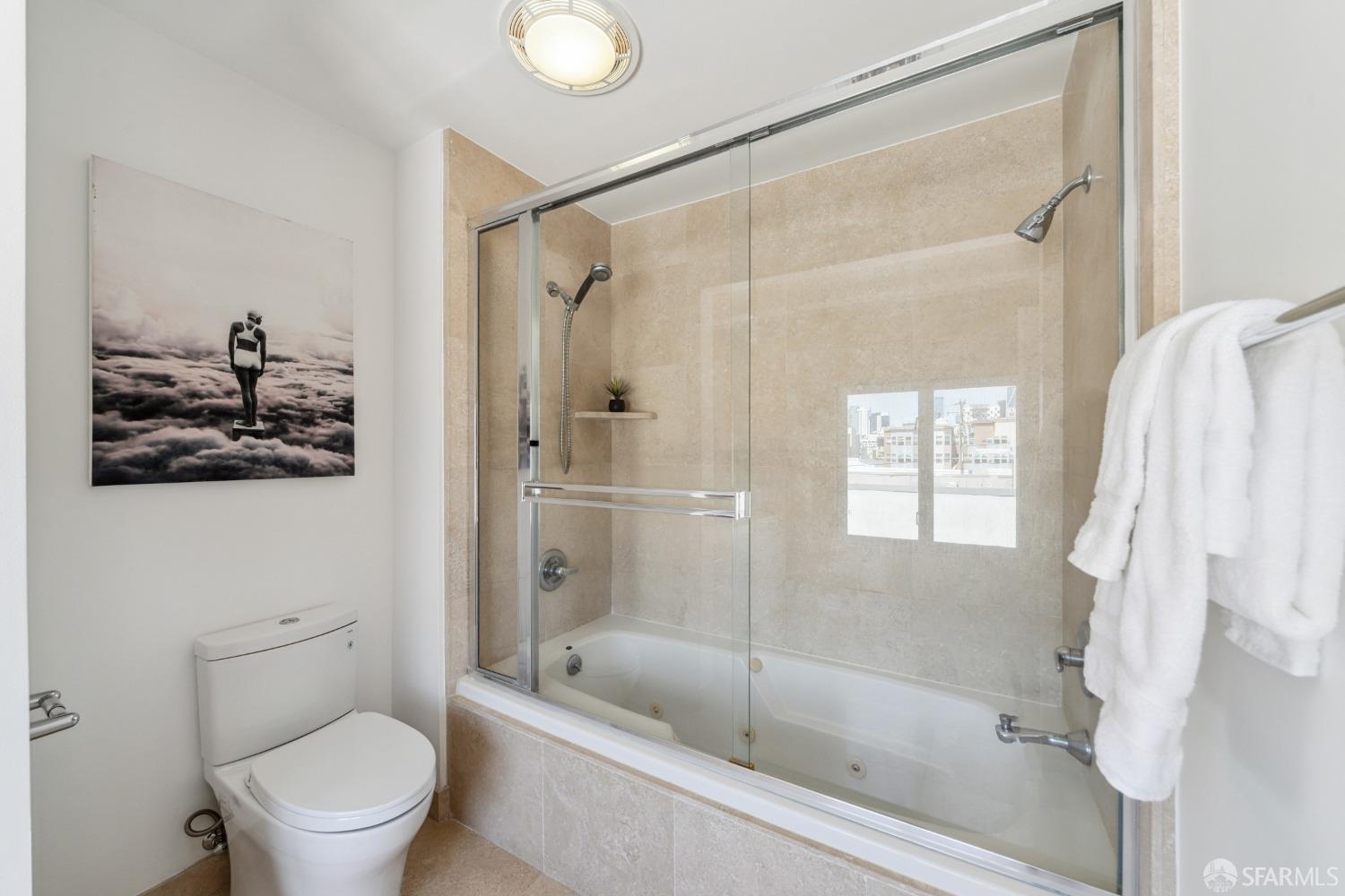 1 Rausch Street, Unit G San Francisco, CA 94103 - Photo 39 of 49 a bath room with a toilet and a bath tub