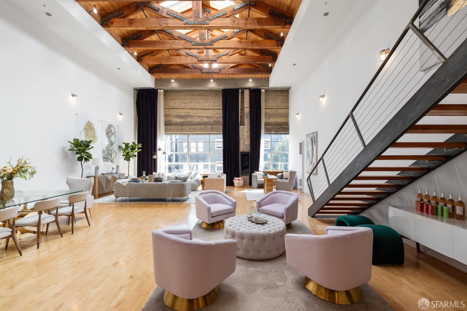1 Rausch Street, Unit G San Francisco, CA 94103 - Photo 4 of 49 a living room with furniture and a chandelier