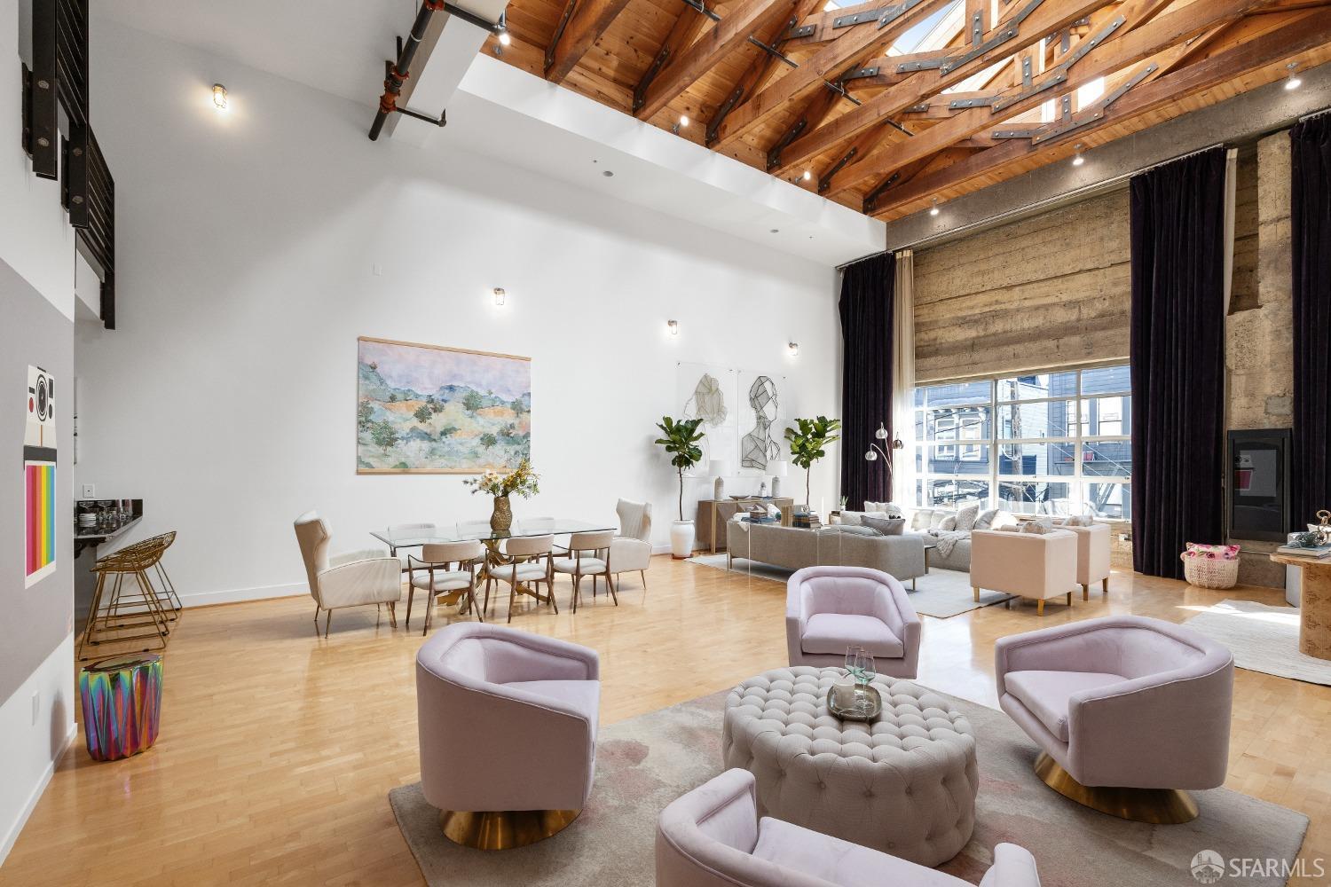 1 Rausch Street, Unit G San Francisco, CA 94103 - Photo 5 of 49 a living room with furniture and a large window