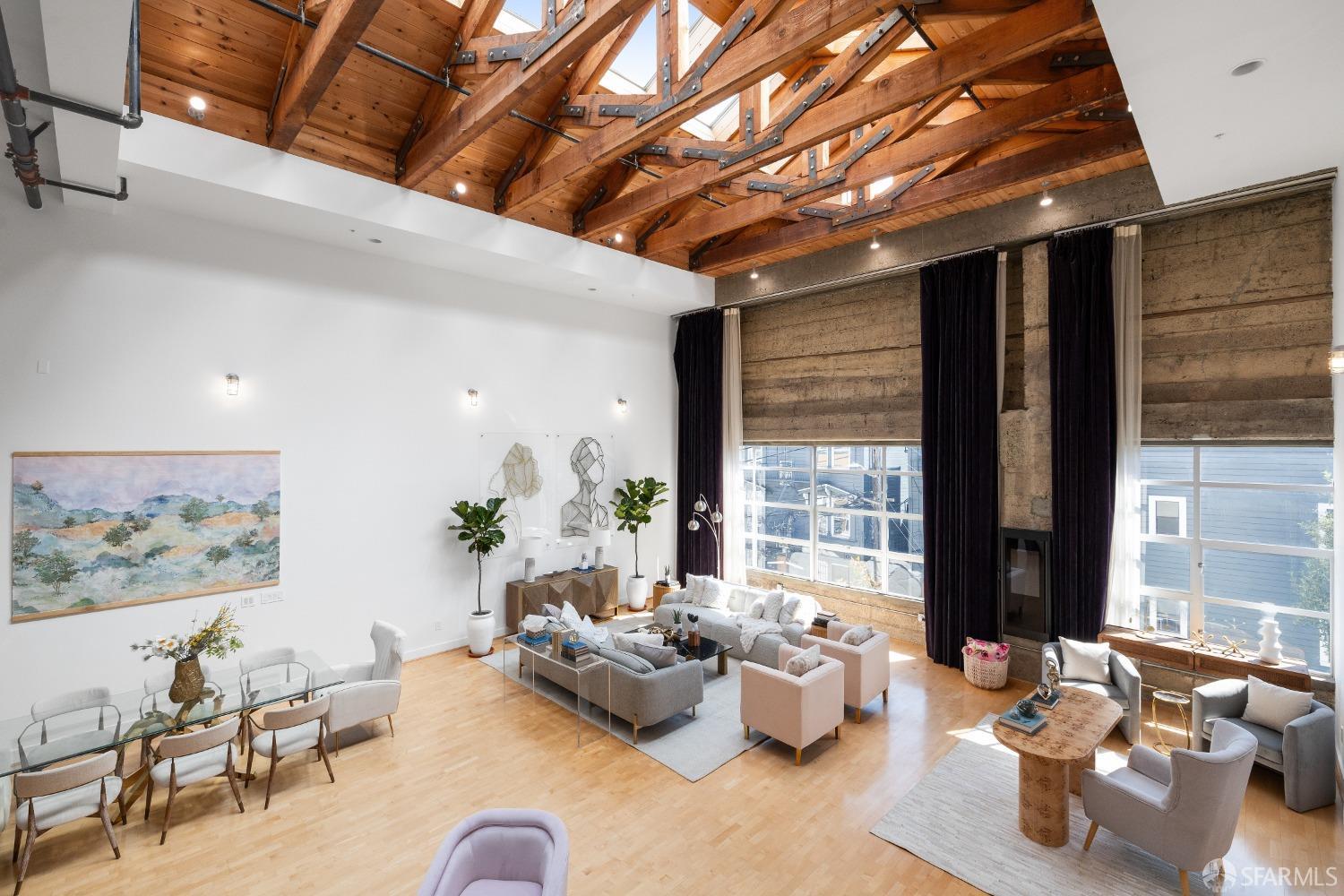 1 Rausch Street, Unit G San Francisco, CA 94103 - Photo 7 of 49 a living room with furniture and floor to ceiling window