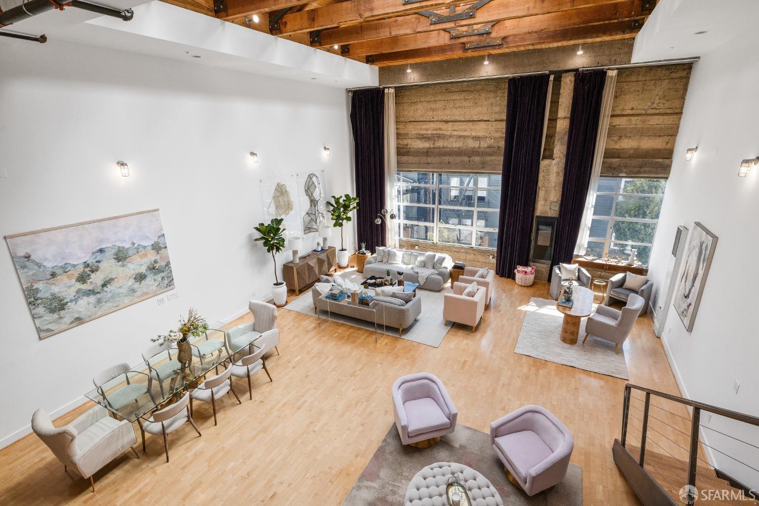 1 Rausch Street, Unit G San Francisco, CA 94103 - Photo 8 of 49 a living room with furniture and a large window