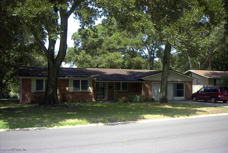 10540 Tulsa Road Jacksonville, FL 32218 - Photo 3 of 3 front view of a house with a yard