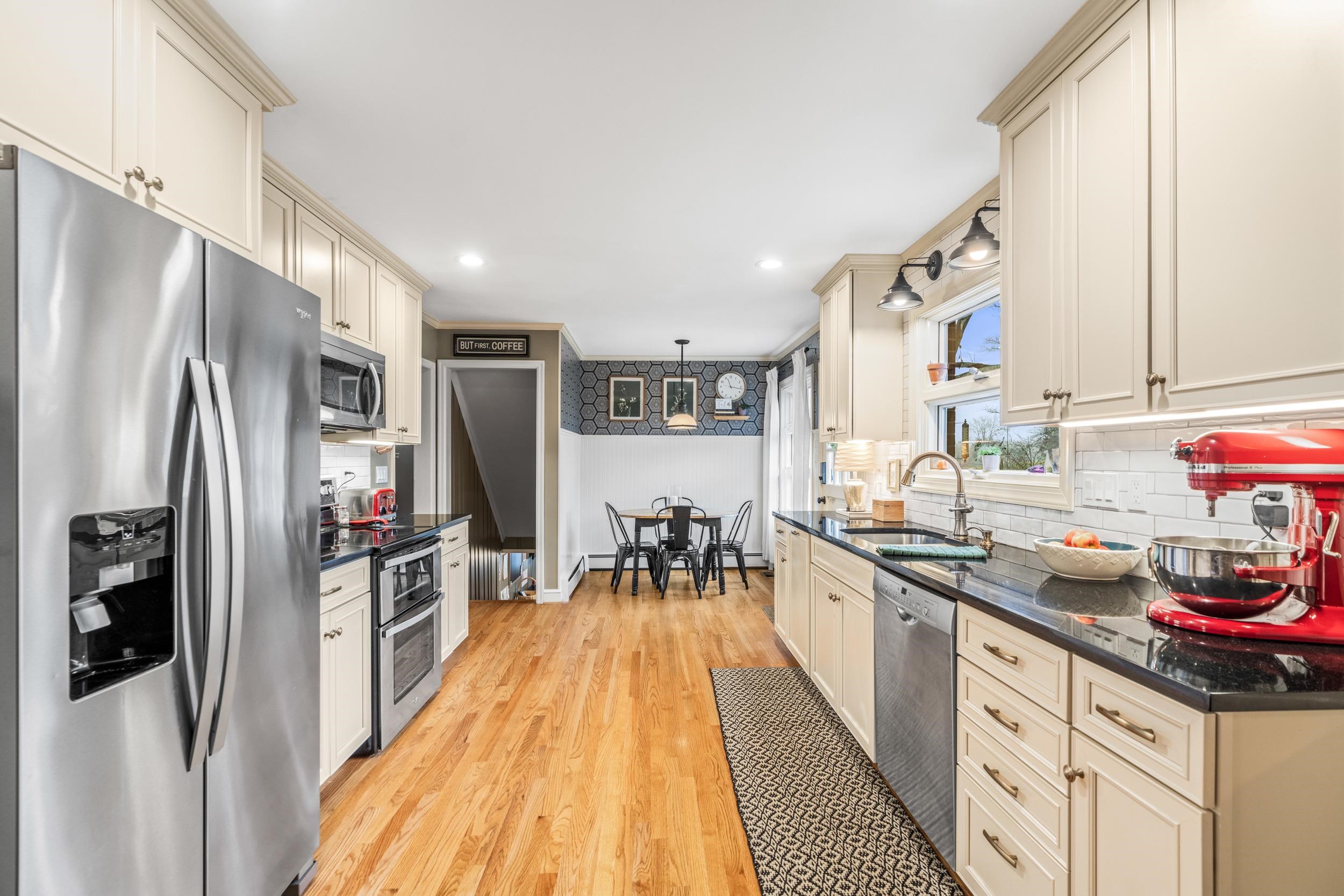 1220 Chatham Road Waynesboro, VA 22980 - Photo 17 of 64 a kitchen with stainless steel appliances a sink stove and refrigerator