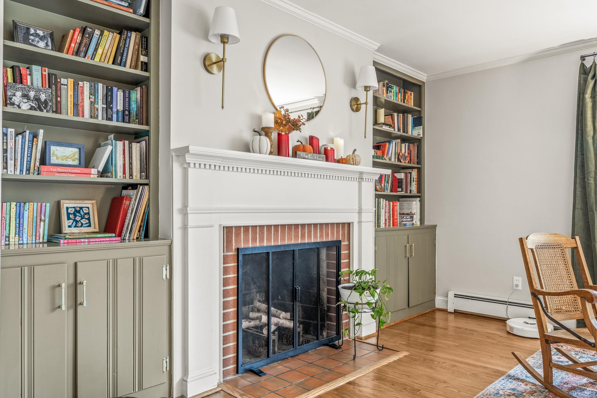 1220 Chatham Road Waynesboro, VA 22980 - Photo 24 of 64 a living room with bookshelf and a fireplace