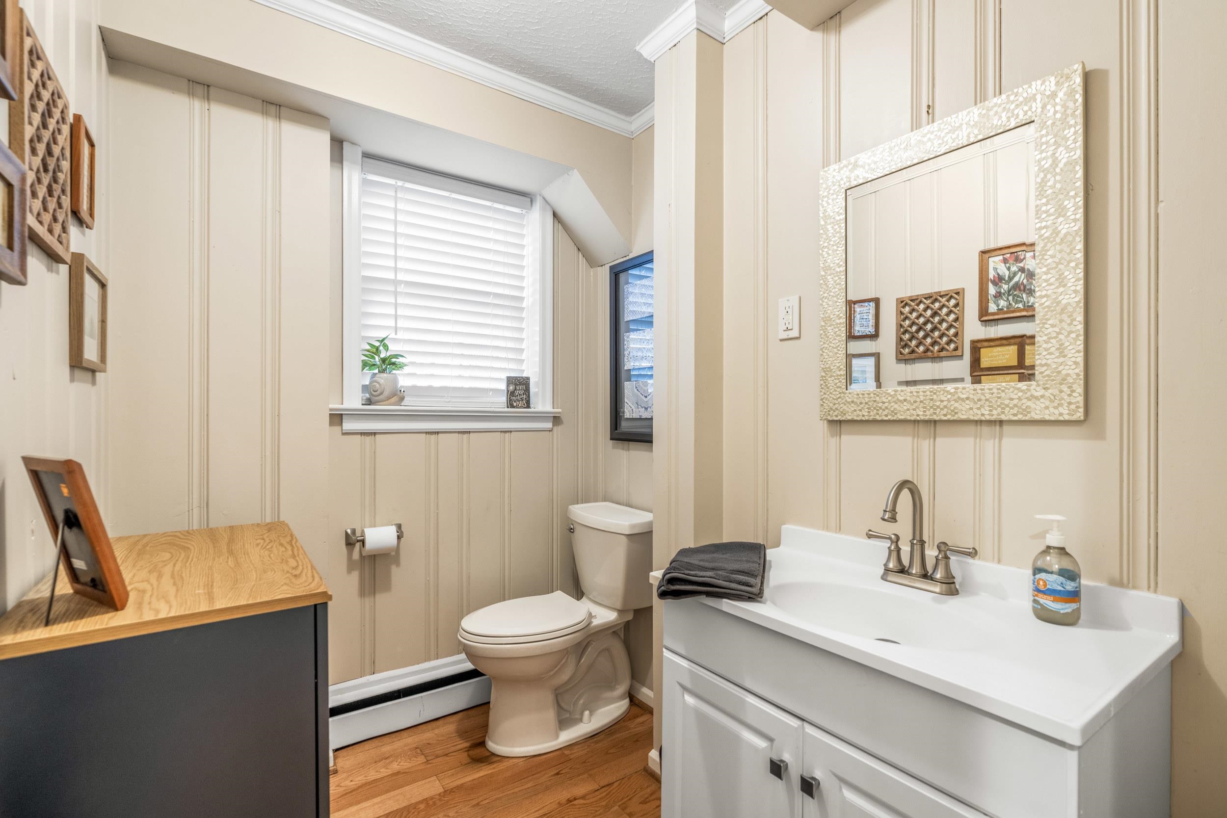 1220 Chatham Road Waynesboro, VA 22980 - Photo 37 of 64 a white toilet sitting next to a bathroom sink