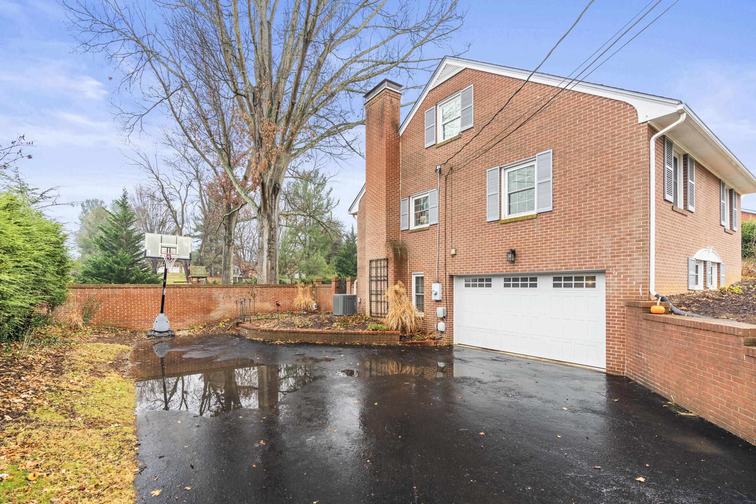 1220 Chatham Road Waynesboro, VA 22980 - Photo 4 of 64 a view of a house with backyard and lake view
