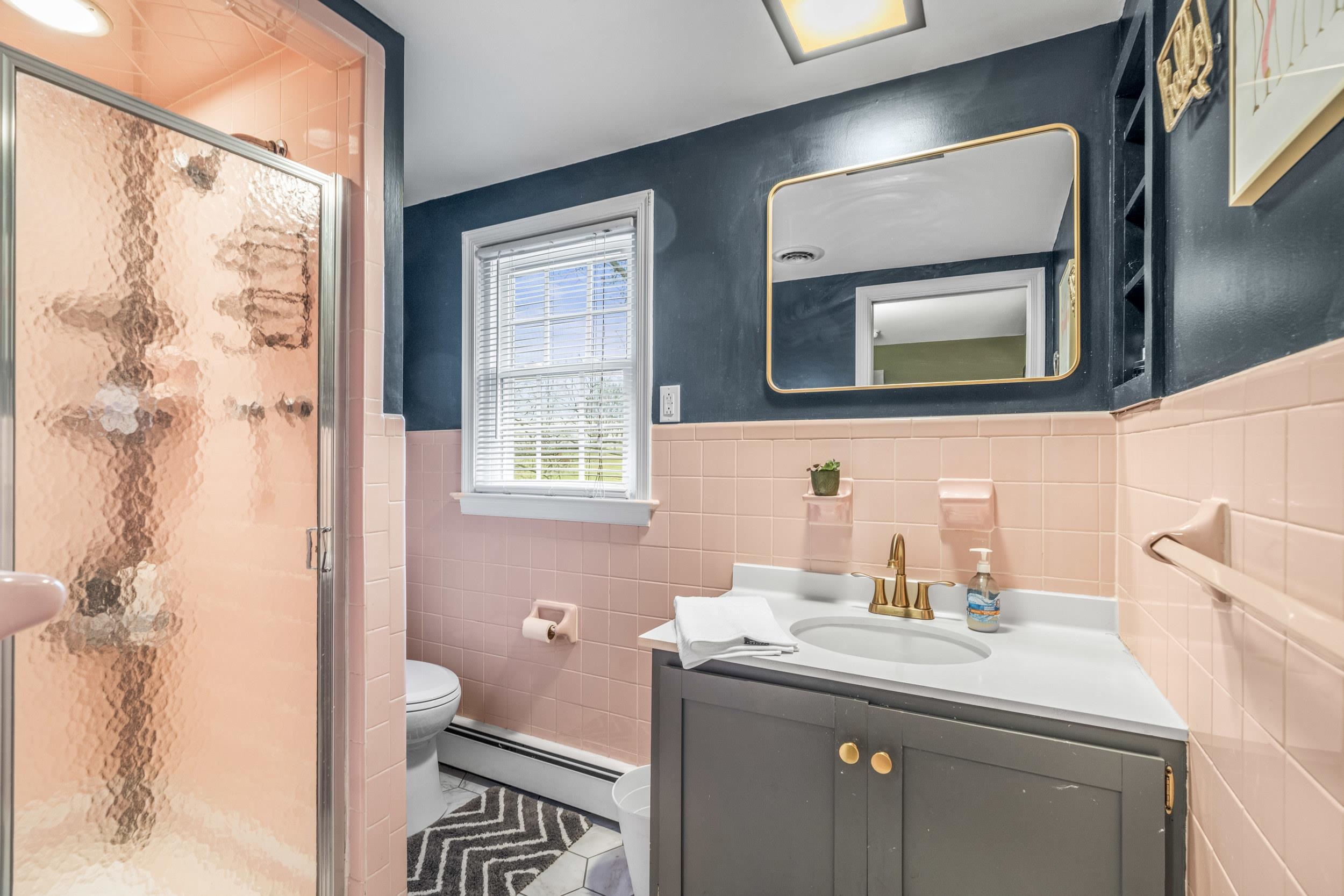 1220 Chatham Road Waynesboro, VA 22980 - Photo 51 of 64 a bathroom with a sink a mirror and a toilet