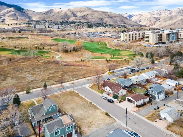 a view of a city with an ocean