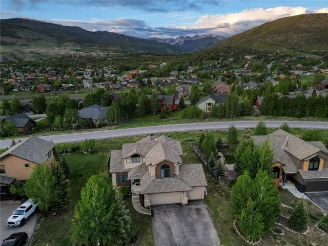 an aerial view of a house with a garden