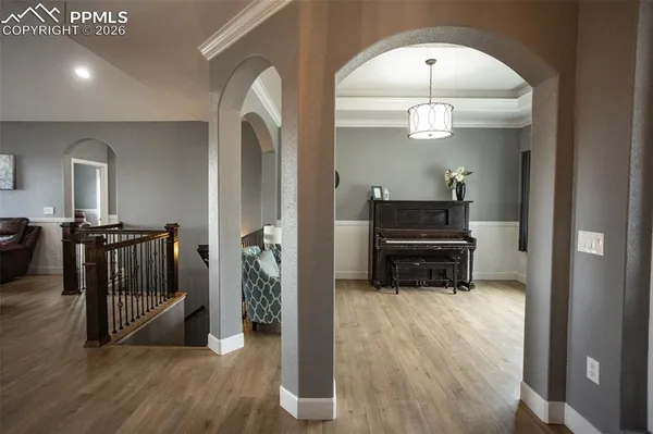 a view of a livingroom with wooden floor