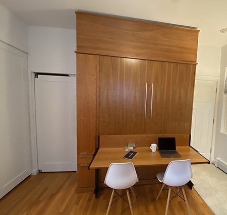 274 Main Street, Unit 5 Gloucester, MA 01930 - Photo 13 of 17 a view of a room with furniture and wooden floor
