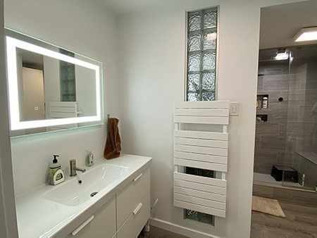 274 Main Street, Unit 5 Gloucester, MA 01930 - Photo 10 of 17 a bathroom with a sink a window and shower