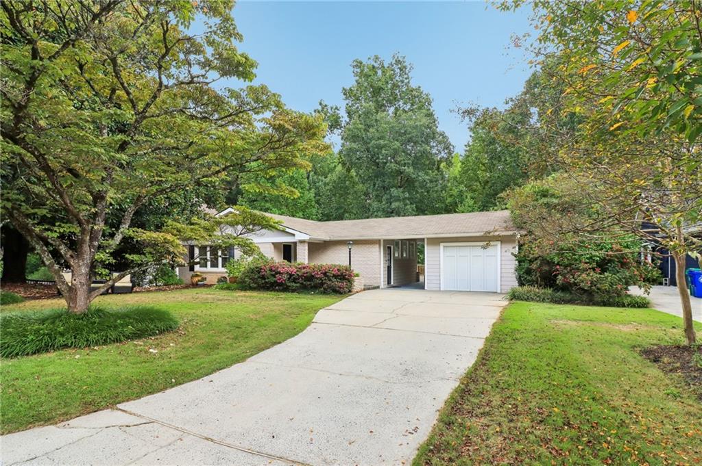 front view of a house with a yard