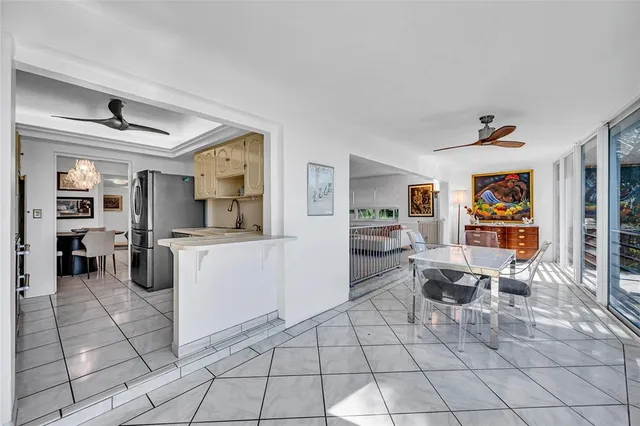 a kitchen with a sink cabinets and appliances