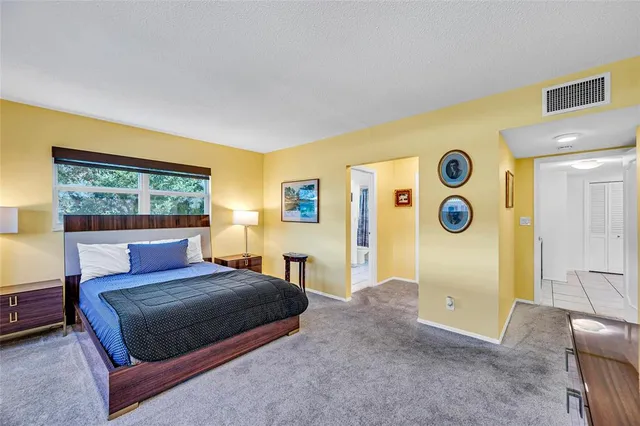 a view of a livingroom with furniture and furniture