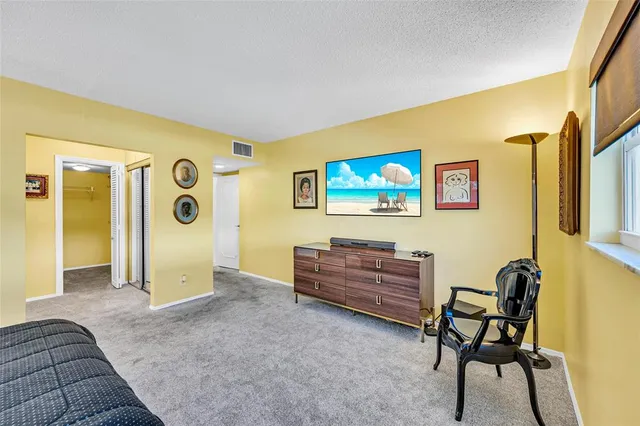 a bathroom with a glass door door