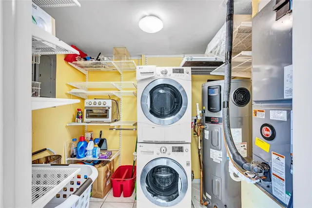 a view of a storage & utility room with washer and dryer
