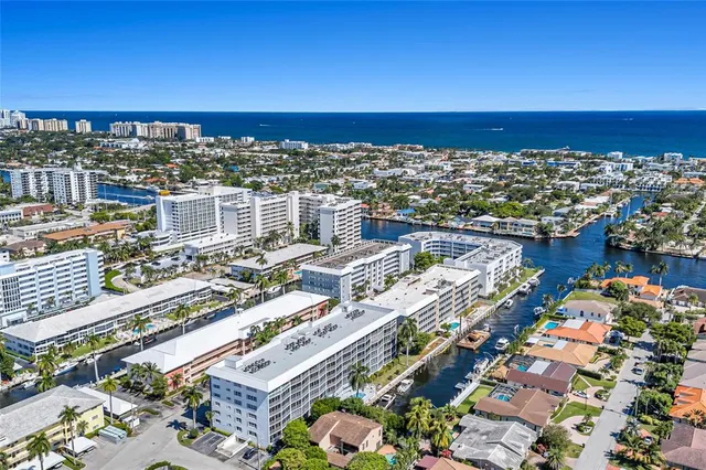 a view of a building with a yard