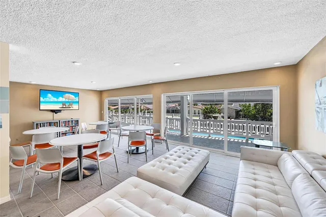 a view of a swimming pool with a chairs