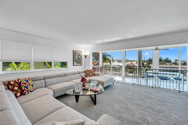 a living room with furniture and a table