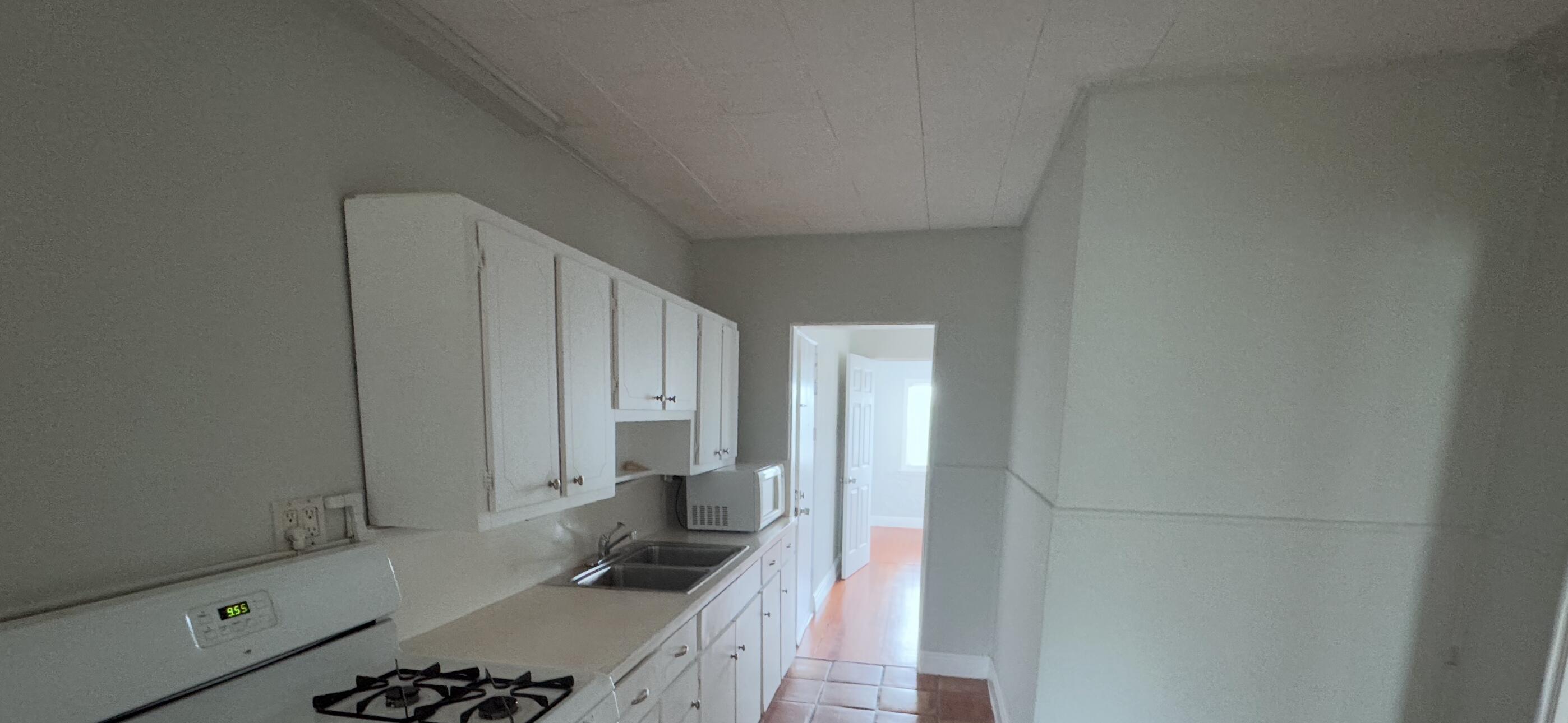 736 Omar Road, Unit 4 West Palm Beach, FL 33405 - Photo 3 of 17 a bathroom with a sink and a shower