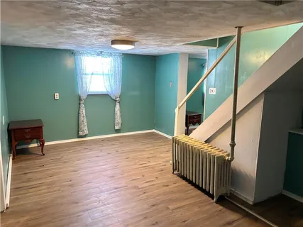 a bathroom with a shower and a tub