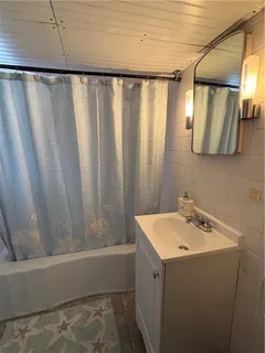 a view of a covered with snow in the yard